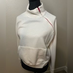 Peloton Side Zip Pullover in white and pink size XS